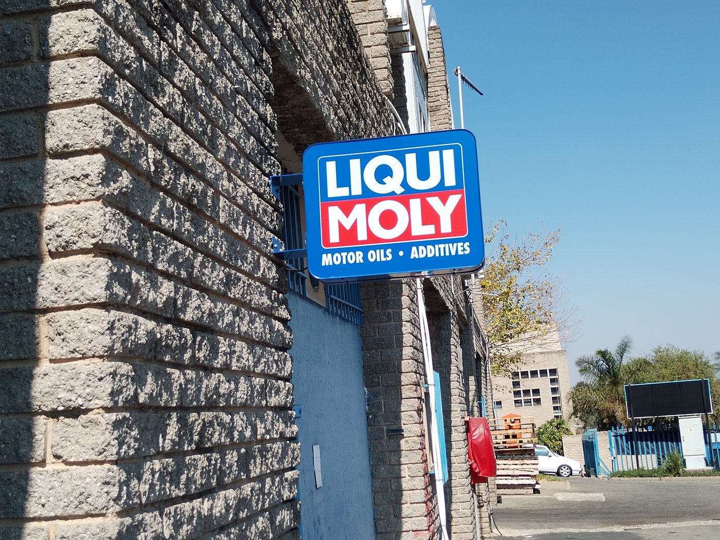 Outdoor illuminated blade lightbox signage for Liqui Moly