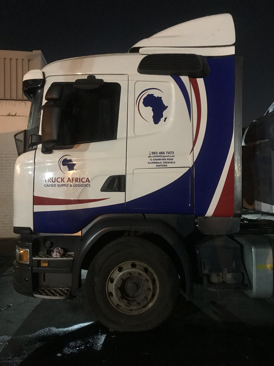Scania truck cab with SANS compliant reflective contour marking and fleet livery