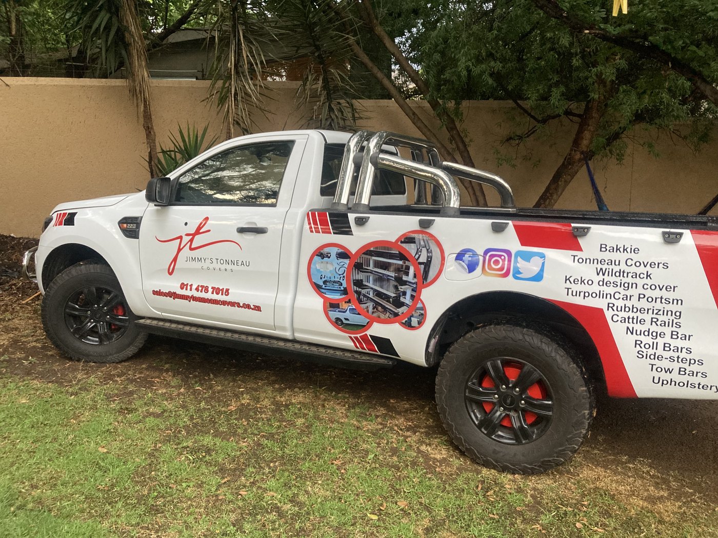 Commercial bakkie vinyl wrap with corporate livery